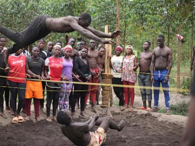 young-ugandans-tangle-in-the-mud.-they-dream-of-becoming-professional-wrestlers