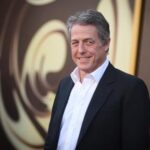 hugh-grant-says-he-got-‘enormous-sum’-to-settle-suit-alleging-illegal-snooping-by-the-sun-tabloid