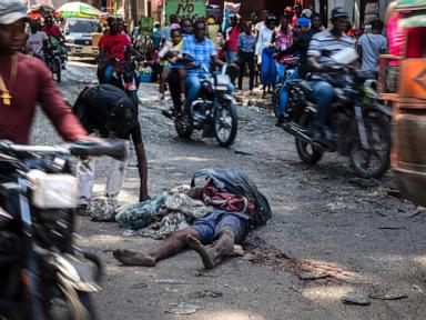 ap-photos:-in-documenting-violence-in-haiti,-you-find-bodies,-but-also-ways-people-keep-on-living