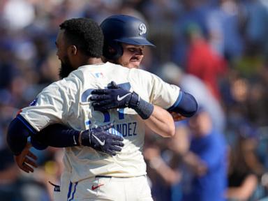 hernandez-and-smith-rally-dodgers-past-red-sox-7-6-in-11-innings