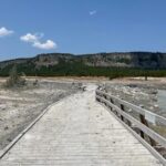 surprise-blast-of-rock,-water-and-steam-in-yellowstone-sends-dozens-running-for-safety