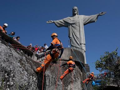 rio-de-janeiro-climbers-clean-site-of-iconic-christ-the-redeemer-statue