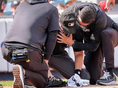 plate-umpire-nick-mahrley-exits-game-between-rockies-and-yankees-after-broken-bat-hits-his-neck