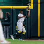 a’s-hit-3-late-homers-after-quiet-start-and-hold-off-reds-5-4