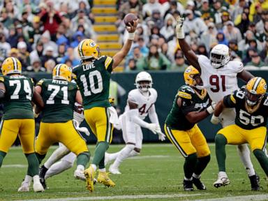 doubs-catches-2-td-passes-in-his-return-from-a-suspension-to-help-packers-rout-cardinals-34-13