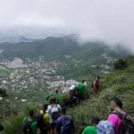 at-one-of-rio-de-janeiro’s-hardest-trails,-a-paraplegic-athlete-climbed-into-clouds