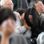 grieving-families-of-victims-of-s.-korean-plane-crash-visit-site-for-memorial-service