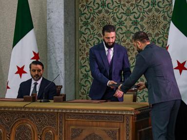 syrian-leader-signs-constitution-that-puts-the-country-under-an-islamist-group’s-rule-for-5-years