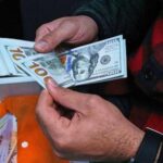 iran’s-currency-falls-to-record-low-against-the-dollar-as-tensions-run-high