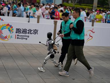 no-sweat:-humanoid-robots-run-chinese-half-marathon-alongside-flesh-and-blood-runners