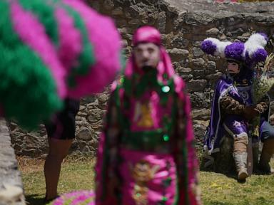 easter-is-celebrated-with-giant-caterpillar-like-hats-and-flames-in-this-mexican-town