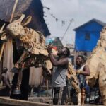 in-nigeria’s-floating-slum,-‘the-herds’-tour-spotlights-climate-change-where-it’s-felt-the-most