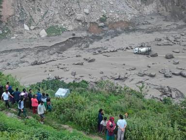 monsoon-floods-sweep-away-18-people-and-the-main-bridge-linking-nepal-to-china