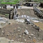 rescuers-expand-search-in-northern-pakistan-for-12-missing-tourists-swept-away-by-floods