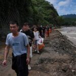 heavy-rain-causes-flooding,-evacuations-and-at-least-38-deaths-around-beijing-region
