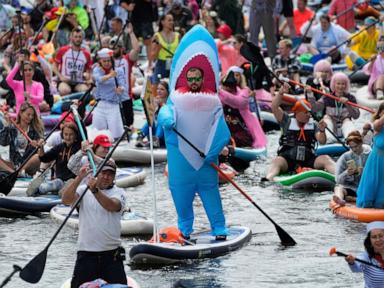 photos-show-costumed-participants-steer-stand-up-paddle-boards-at-a-festival-in-russia