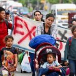 about-300-migrants-start-walk-north-from-southern-mexico.-their-goal-is-not-the-us-border
