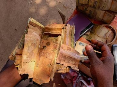a-rebel-held-congolese-city-uses-damaged-banknotes-due-to-a-cash-shortage