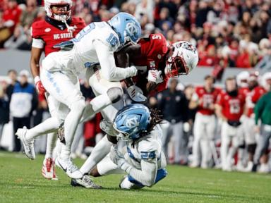 wilson-runs-for-4-tds-as-nc-state-beats-unc-42-19,-winning-rivalry-game-for-5th-straight-year
