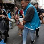 argentine-workers-clash-with-police-as-senators-debate-labor-reform,-in-photos