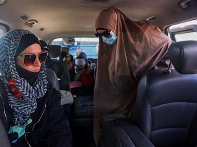 australians-with-alleged-is-ties-are-turned-back-after-departing-syrian-camp-for-repatriation