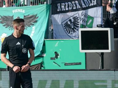 masked-fan-unplugs-var-monitor-at-german-soccer-game-to-disrupt-video-review