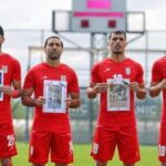 iran-soccer-players-honor-alleged-child-victims-of-the-war-before-world-cup-warmup