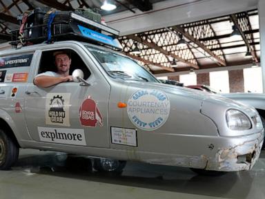 how-2-men-claimed-an-absurd-record-by-driving-an-old-3-wheel-car-the-length-of-africa