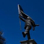 banksy-confirms-a-new-statue-in-central-london-of-a-man-blinded-by-a-flag-is-his-work