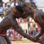 in-senegal’s-wrestling-arenas,-rituals-share-the-spotlight-with-the-fight,-in-photos