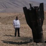 israel-and-iran-trade-strikes,-threatening-to-drag-region-back-to-full-scale-war