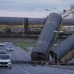 2-freight-trains-collide-in-germany,-sending-2-wagons-plunging-off-bridge;-1-dead