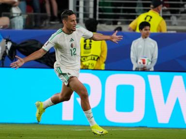 algeria-rallies-past-jordan-2-1-for-its-first-win-at-a-world-cup-since-2014