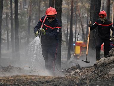 1000-evacuated-from-fire-near-paris;-spanish-authorities-identify-fire-victims