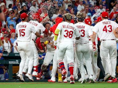 herrera-doubles-as-cardinals-rally-to-beat-cubs-3-2-in-10-innings